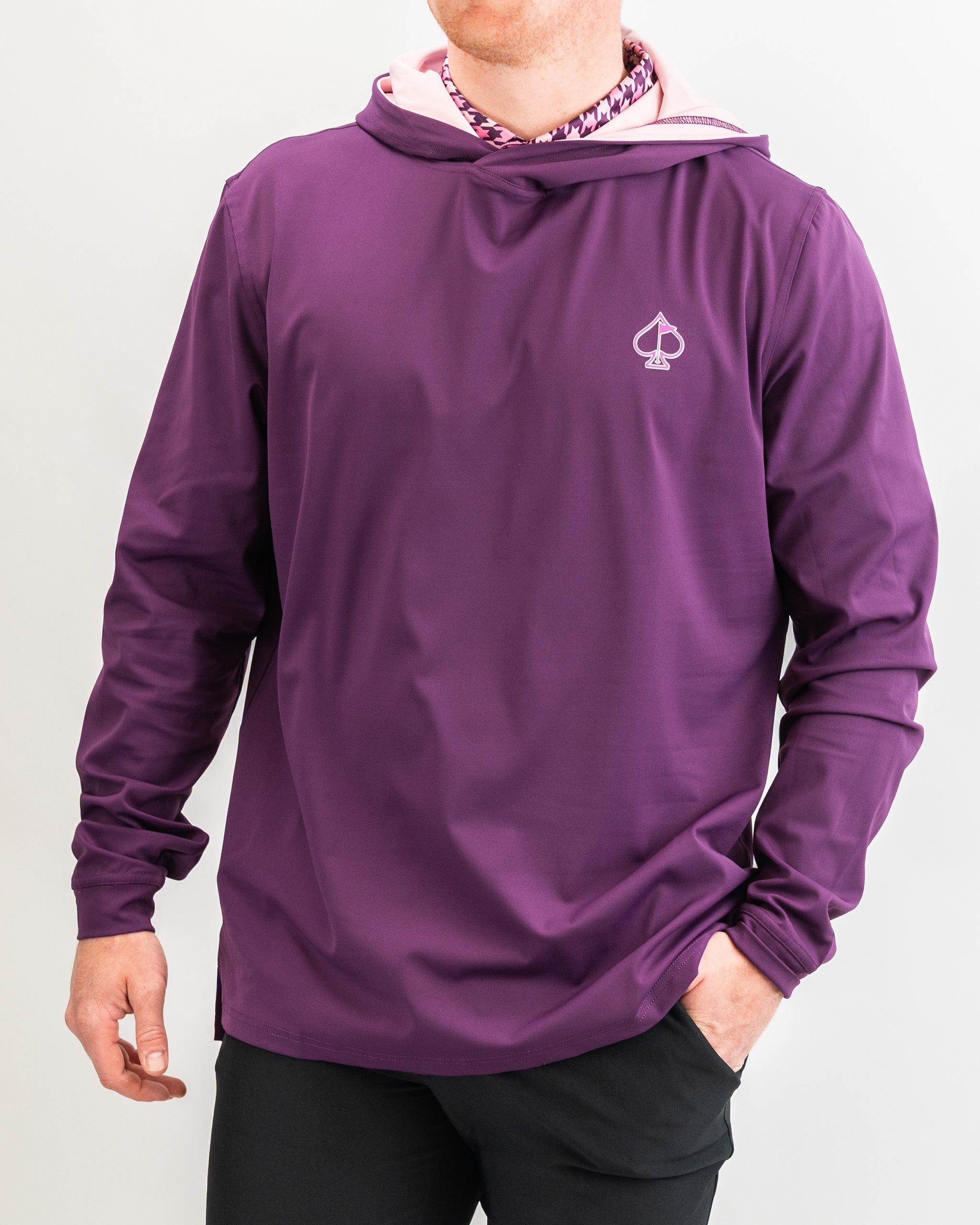 Performance Golf Hoodie in Houndstooth Raspberry, featuring a stylish pattern and a modern fit, ideal for golfers.