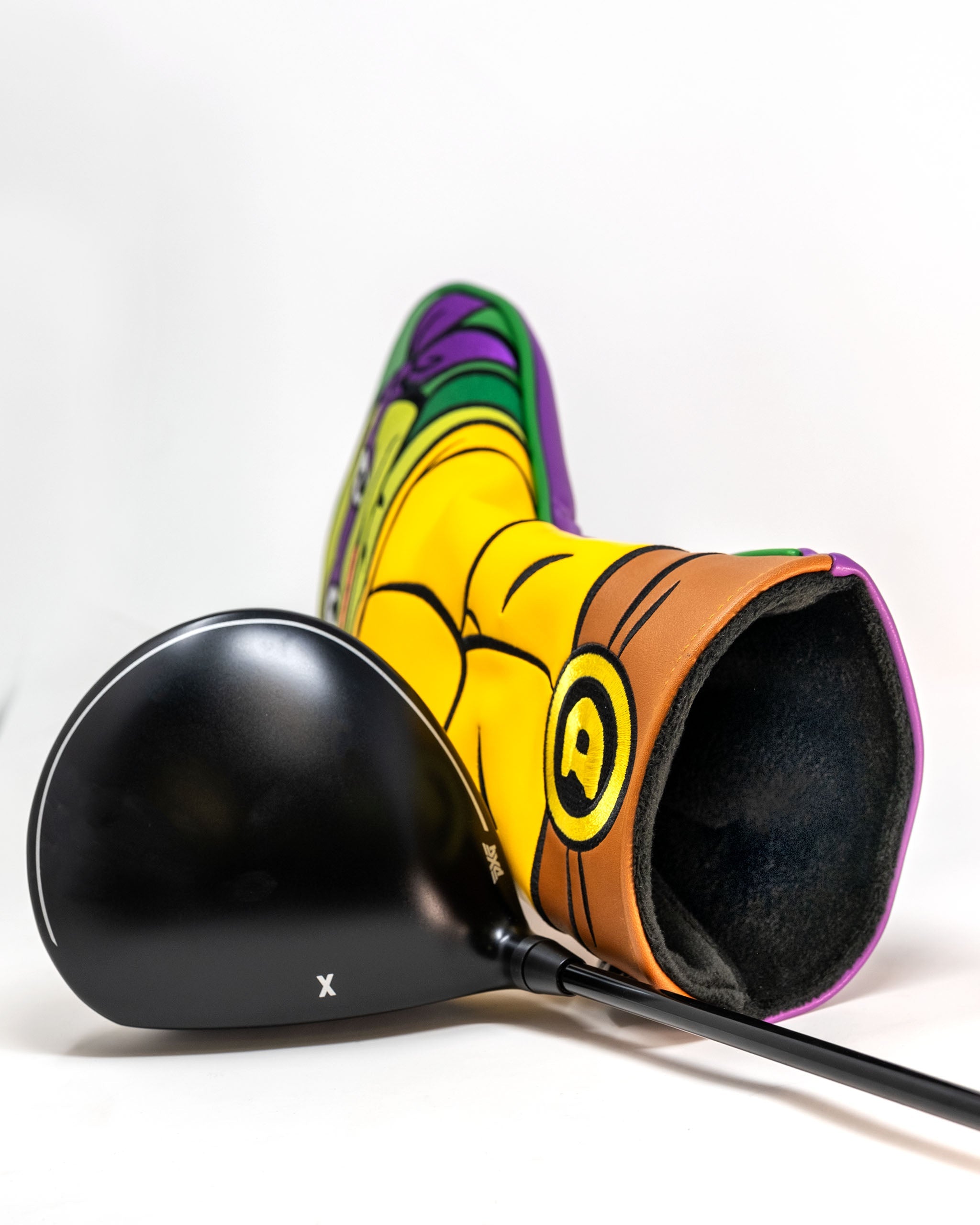 TMNT Donatello driver cover featuring vibrant purple design with Donatello's face and iconic elements from Teenage Mutant Ninja Turtles.