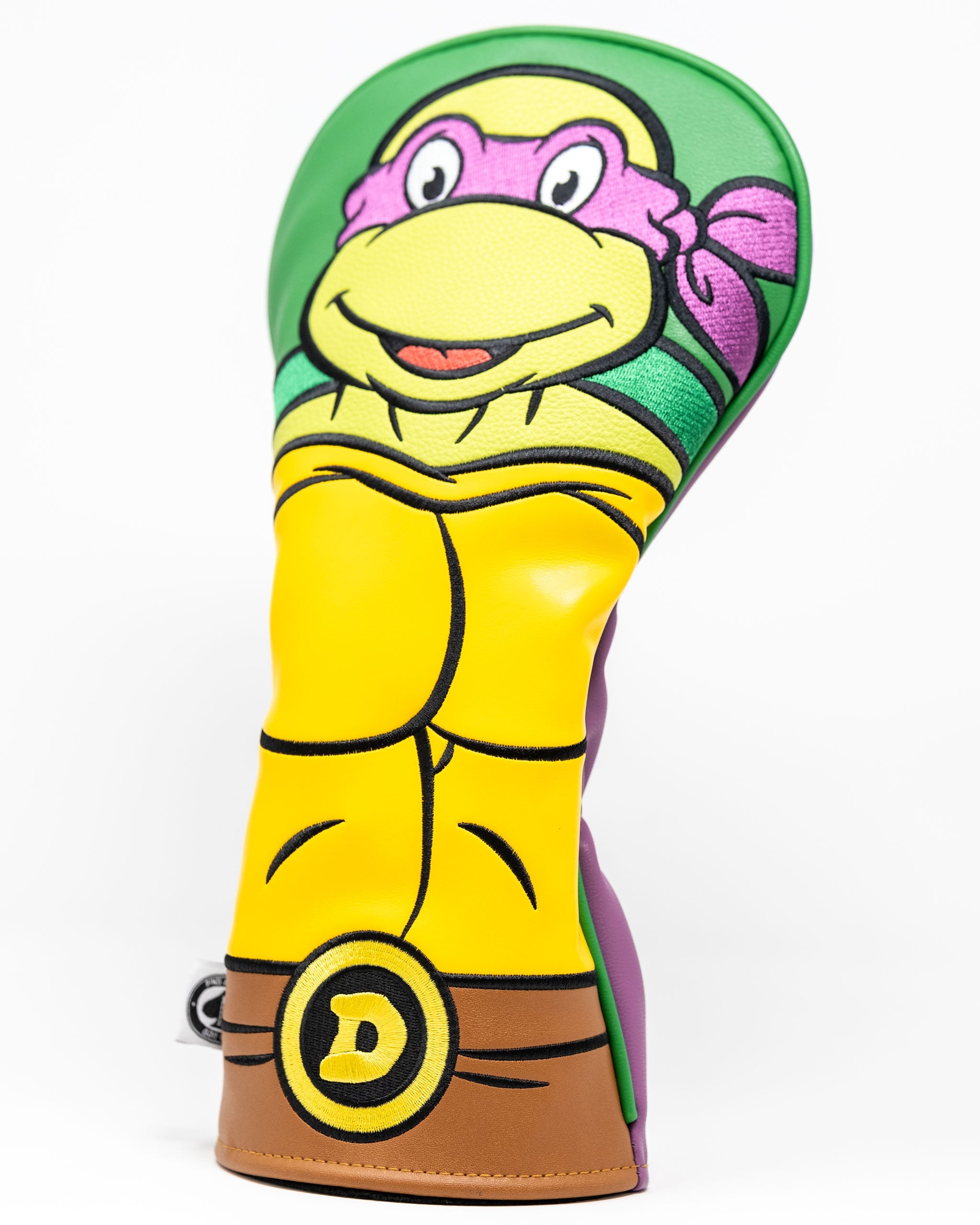 TMNT Donatello driver cover featuring a vibrant green design with Donatello's face and signature purple bandana.