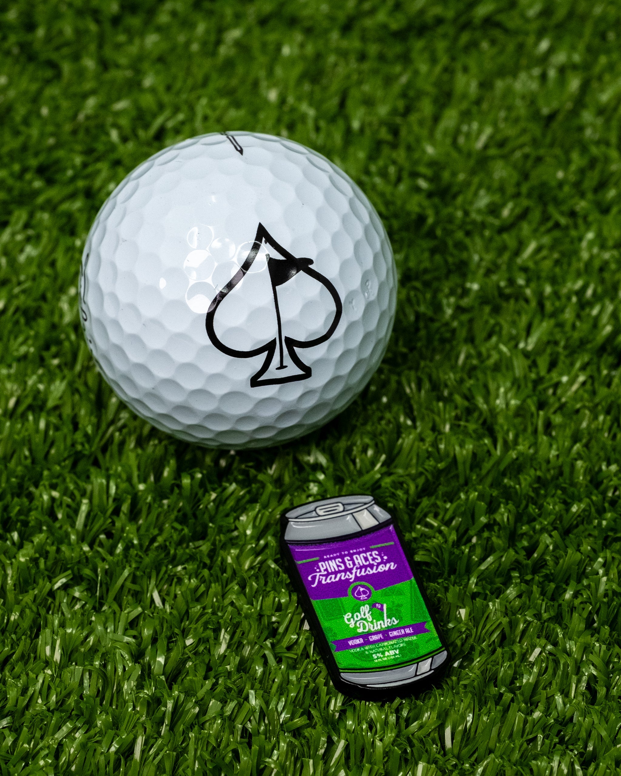 Transfusion Can Ball Marker featuring a sleek design with a vibrant can graphic, designed for golf enthusiasts.