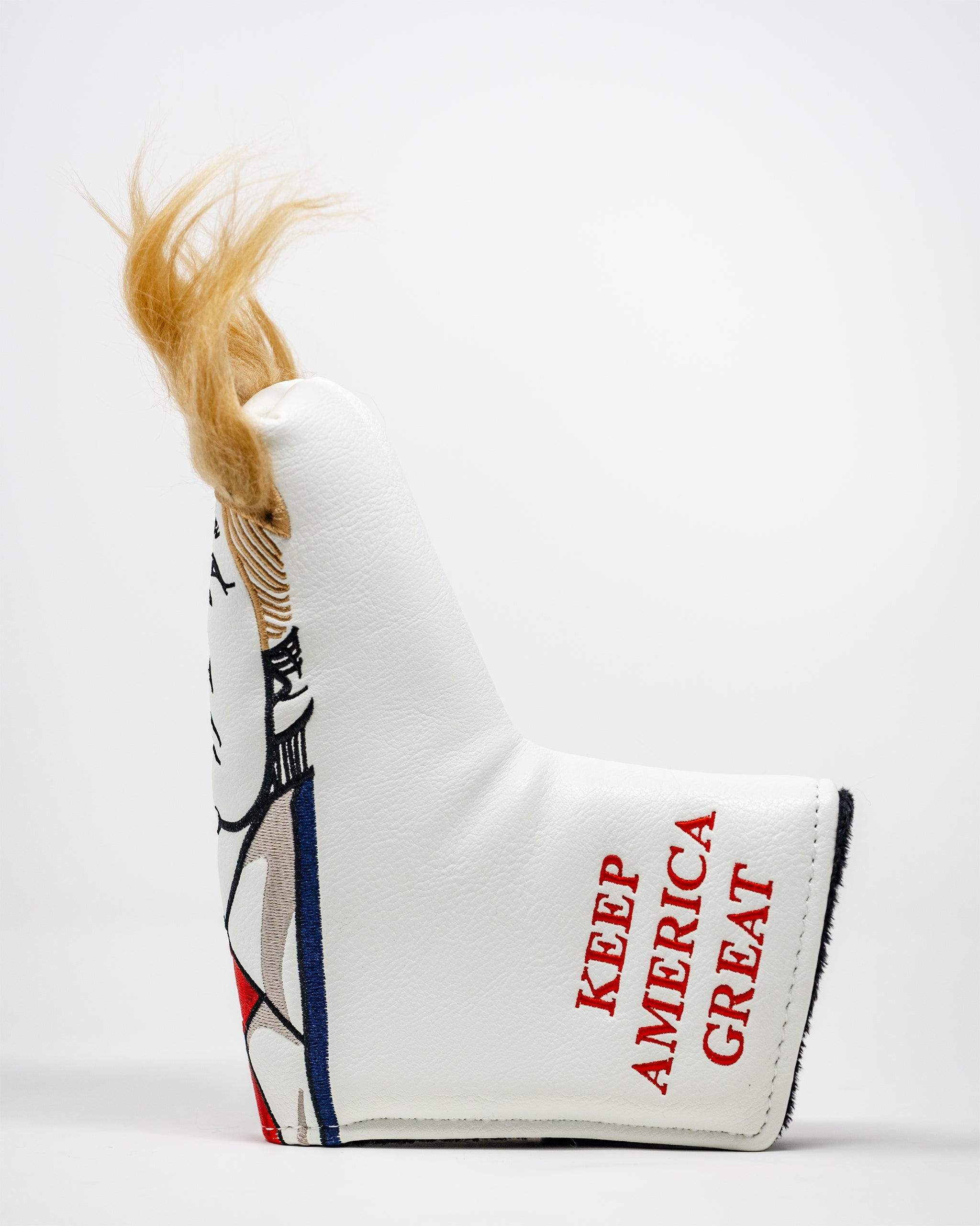Trump Blade Putter Cover featuring a vibrant design and durable material, designed to protect and enhance any golf putter.