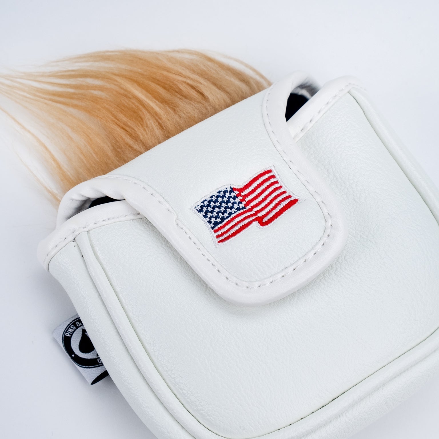 Trump mallet putter cover featuring a sleek design with detailed stitching and an embroidered logo.