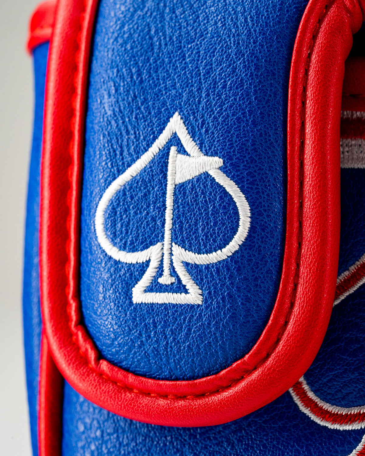 USA Tribute 2.0 center shaft mallet putter cover featuring a blue and red design with an embroidered spade logo.