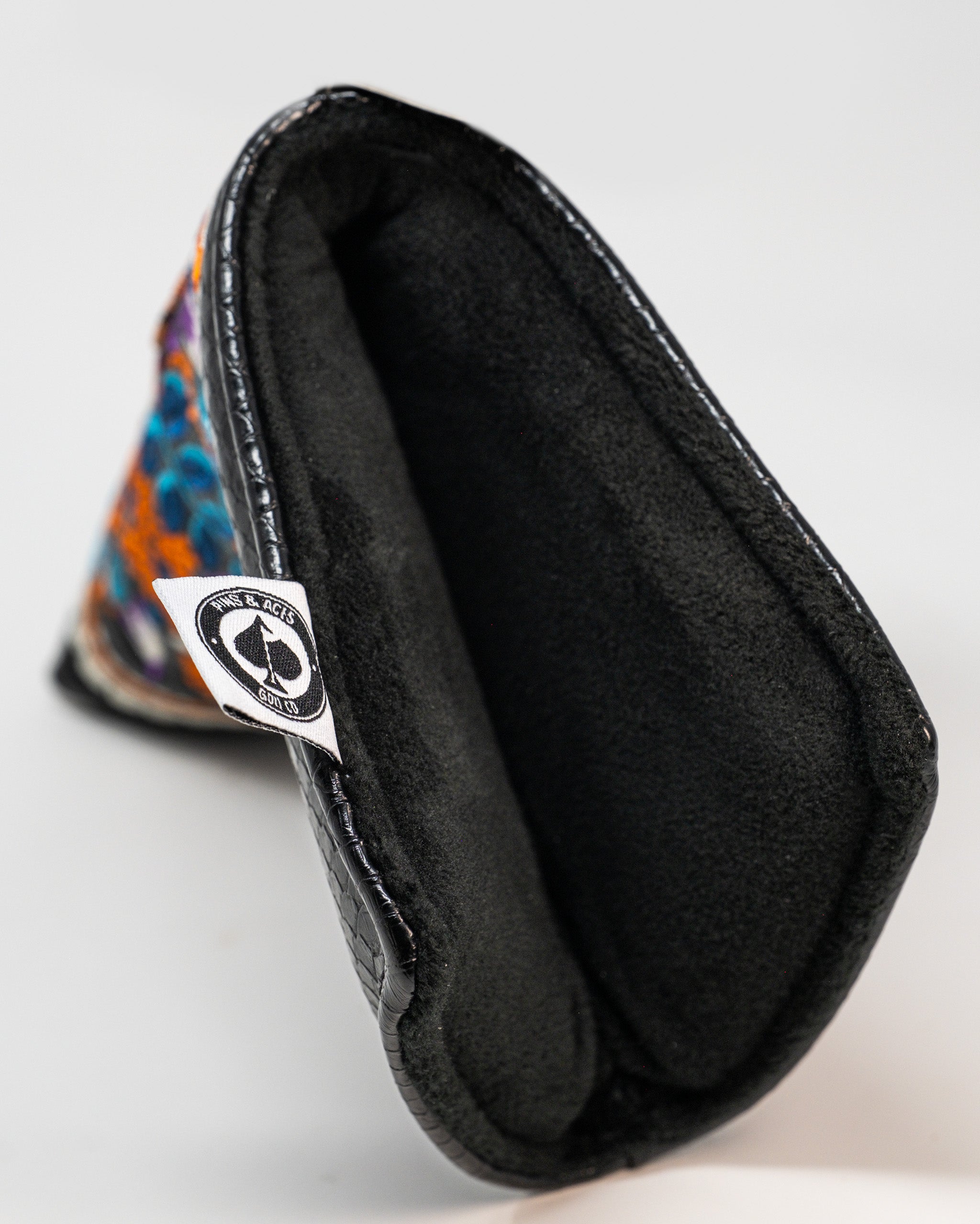 Venom Blade Putter Cover featuring a sleek design with venomous snake graphics in vibrant colors.