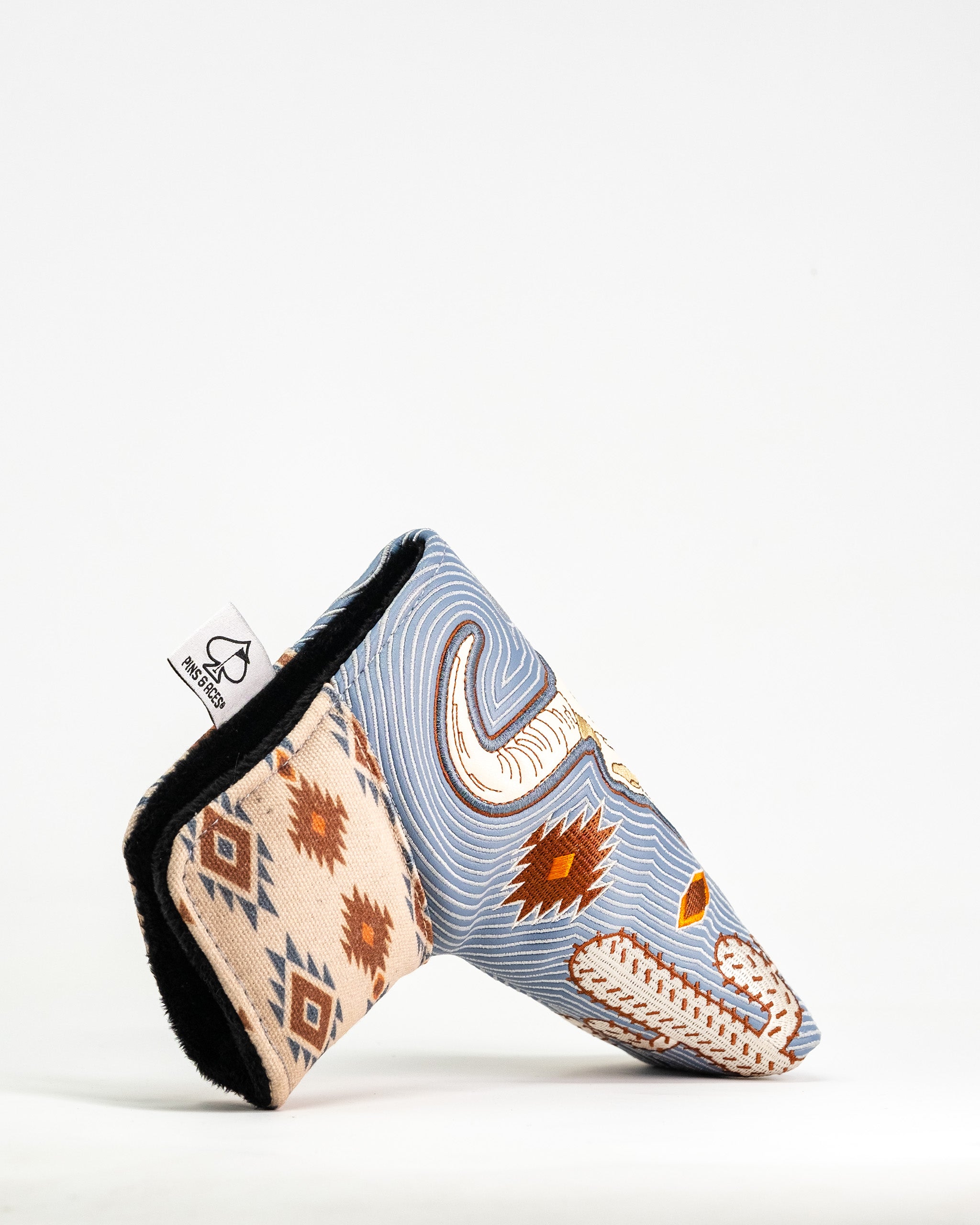 Western Aesthetic Blade Putter Cover with a southwestern-inspired fabric design featuring geometric patterns and earthy tones.