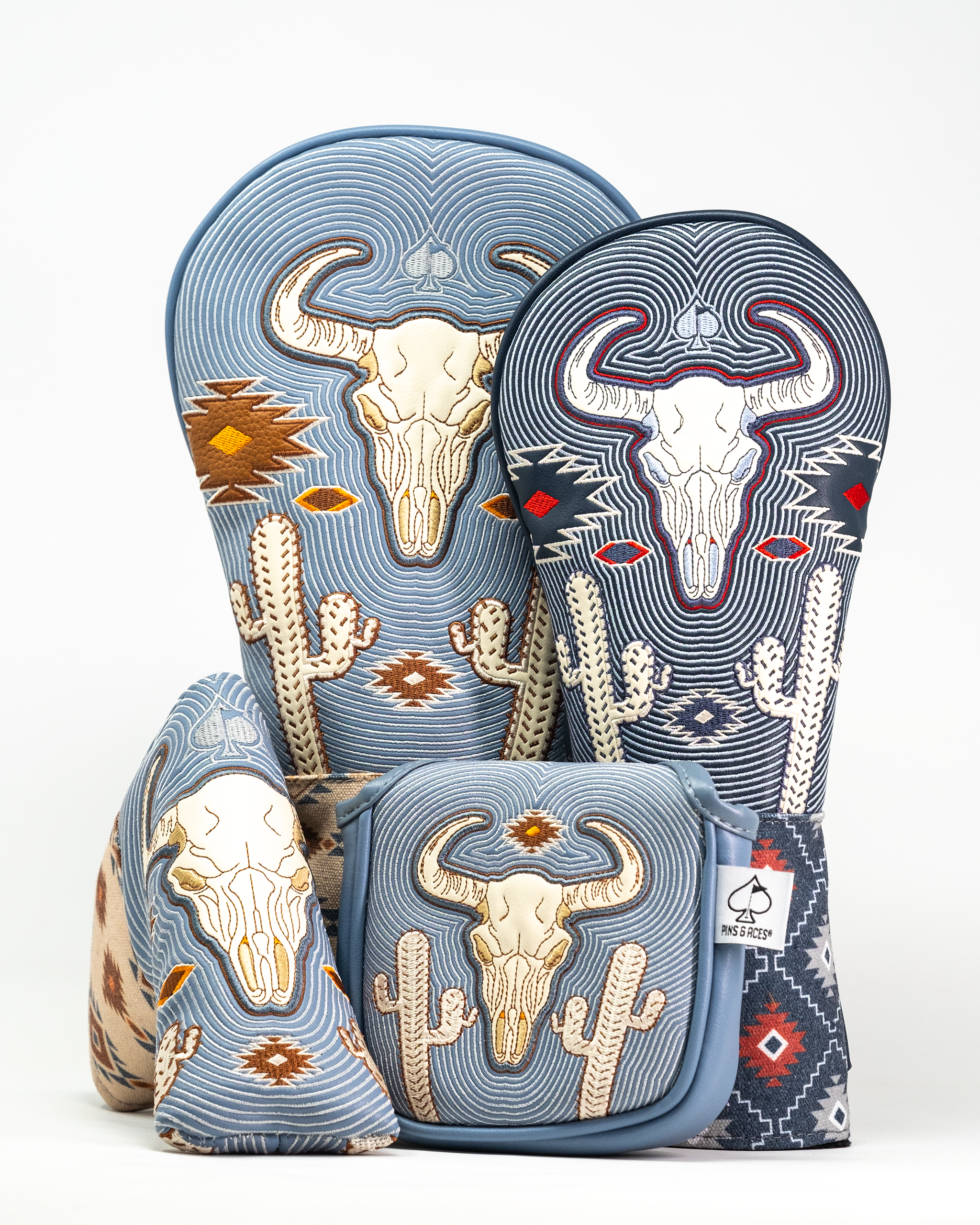 Western Aesthetic Blade Putter Cover featuring embroidered bull skulls, cacti, and southwestern-inspired patterns in blue and neutral tones.