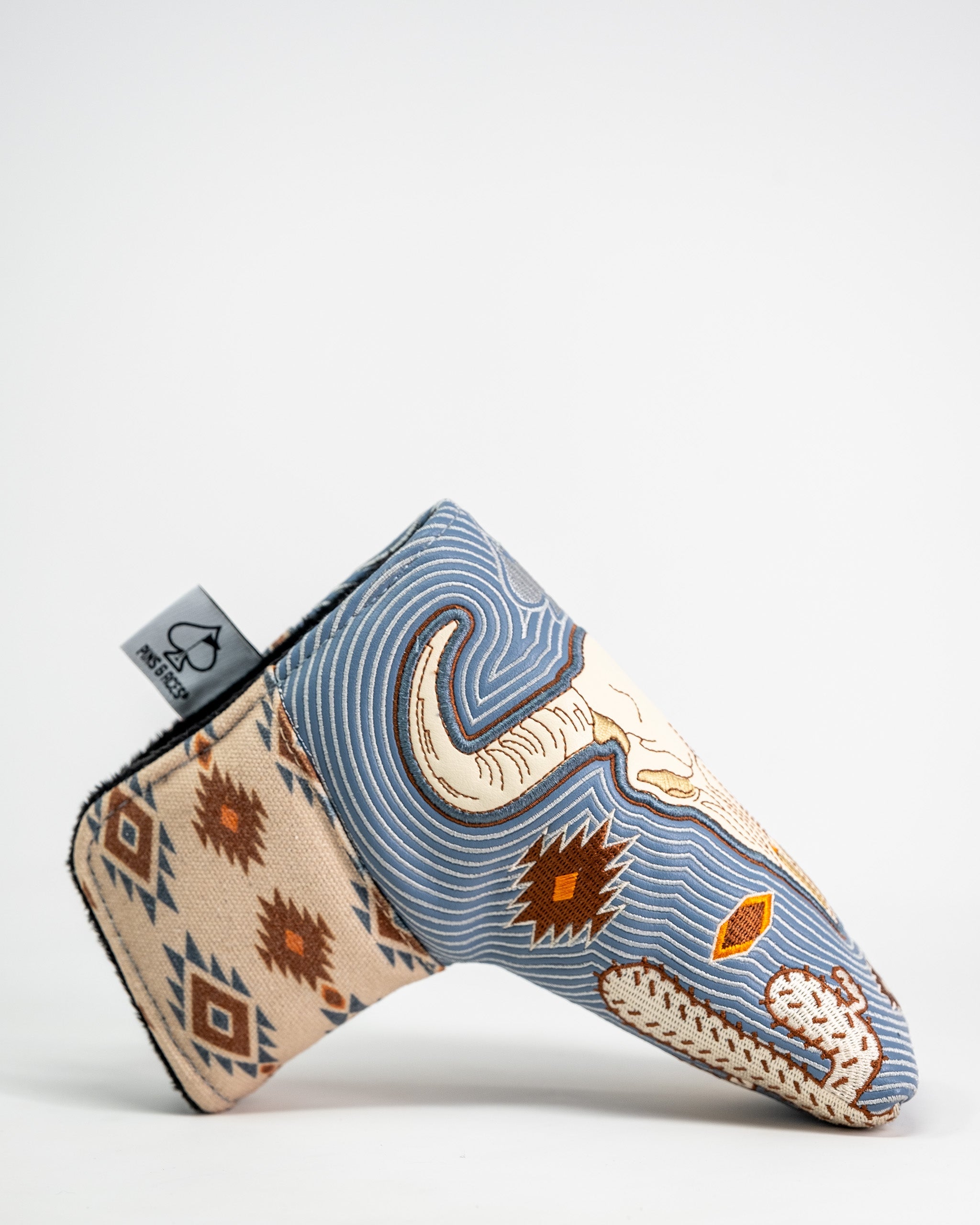 Western Aesthetic Blade Putter Cover with a desert and snake design in blue, beige, and brown tones.