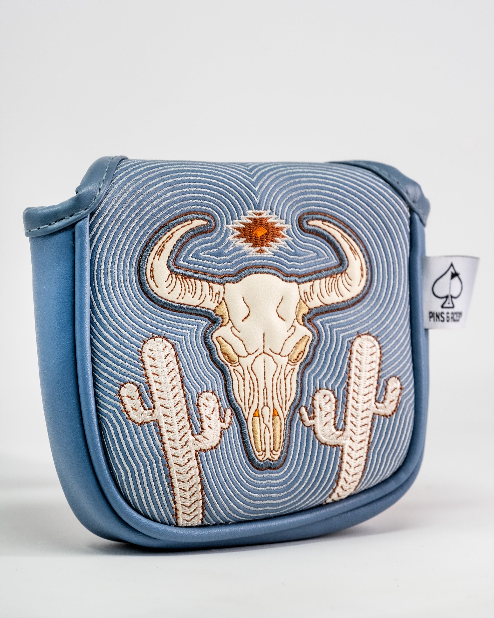 Embroidered Western Aesthetic Mallet Putter Cover featuring a bull skull, cacti, and southwestern design on a blue background.