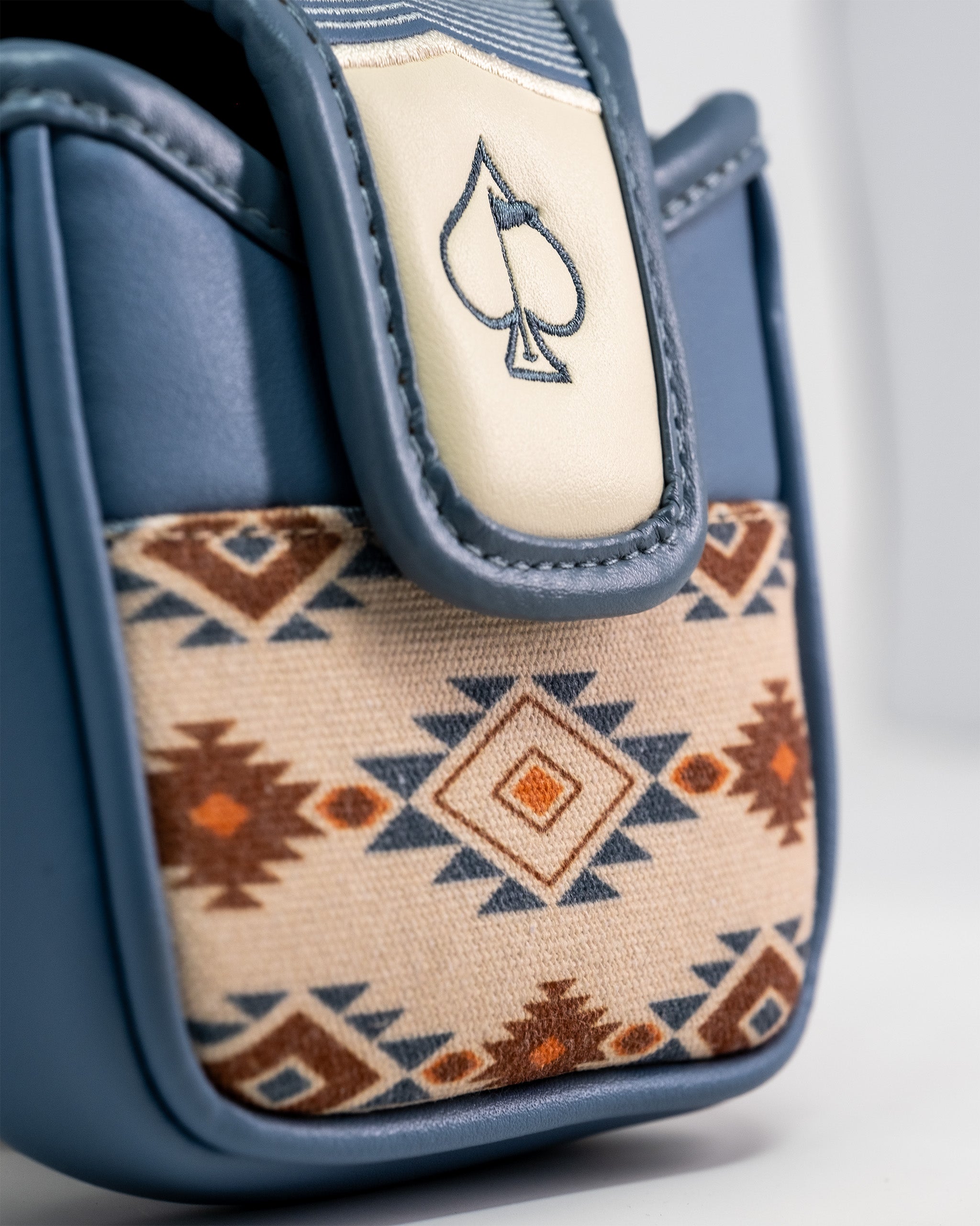 Western Aesthetic Mallet Putter Cover with a geometric fabric design and a spade emblem embroidered on a cream patch.