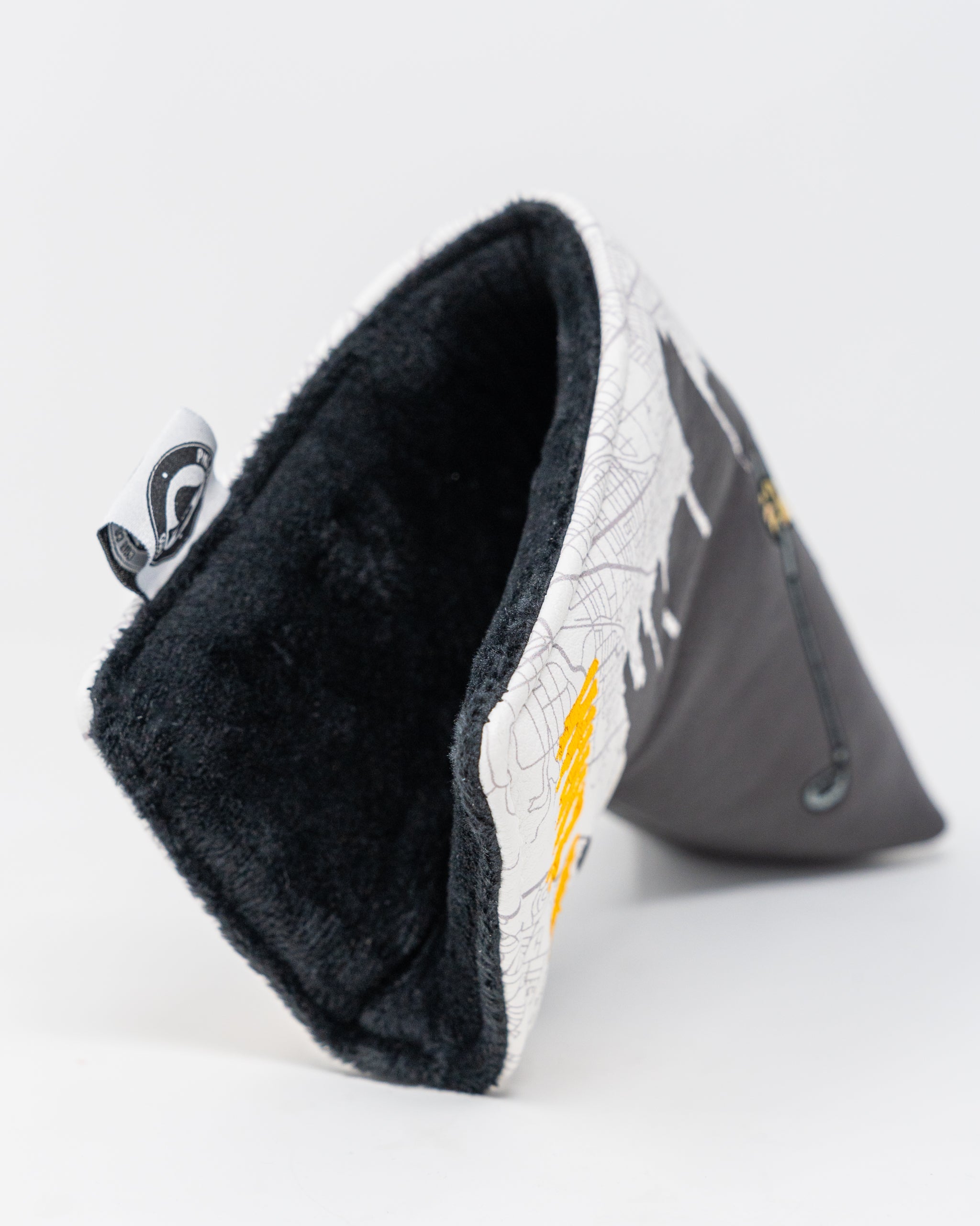 Whiz Wit Blade Putter Cover featuring a vibrant design with a witty logo and durable material, designed to protect golf putters.