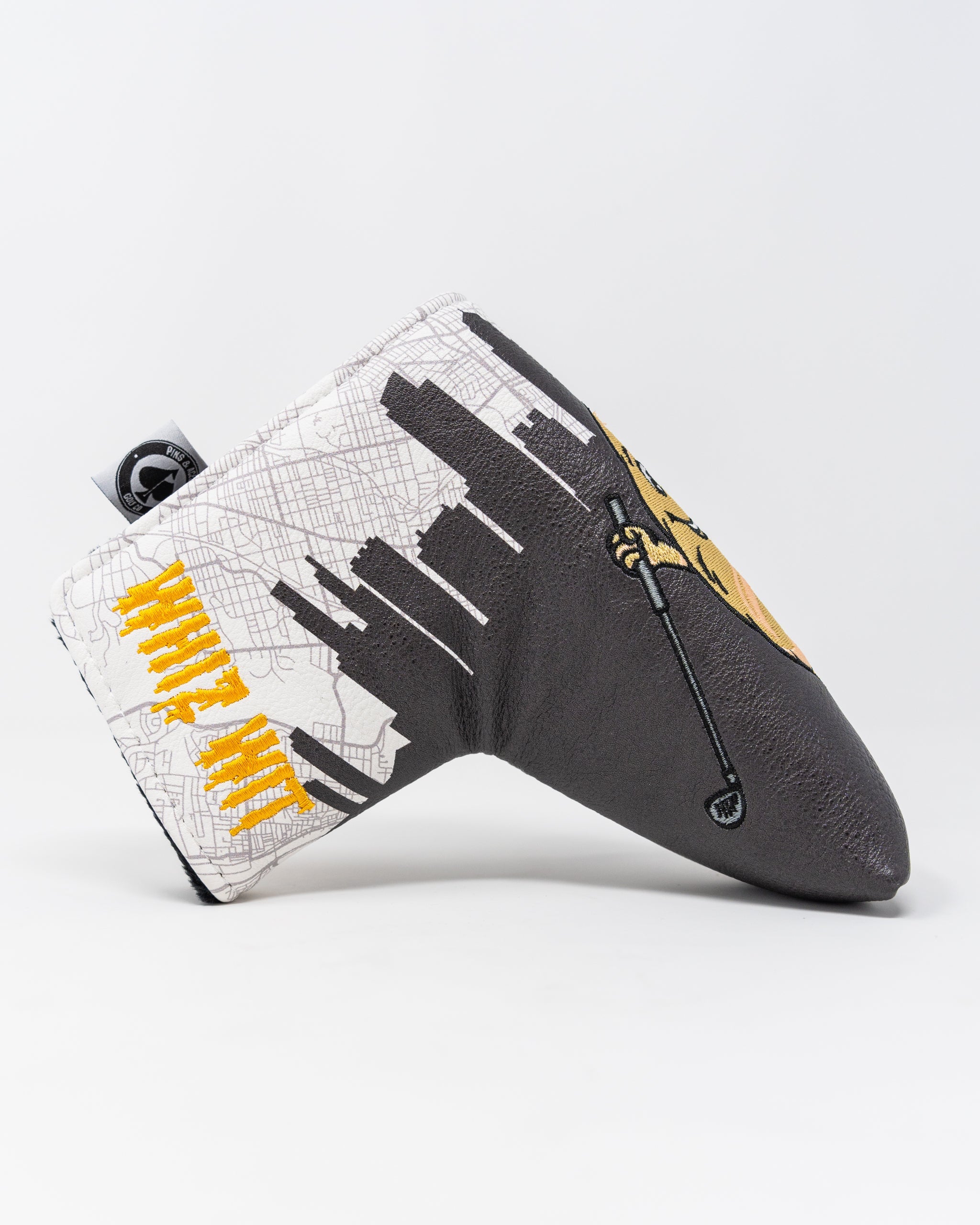 Whiz Wit Blade Putter Cover featuring a vibrant design with a bold color scheme, ideal for golf enthusiasts.