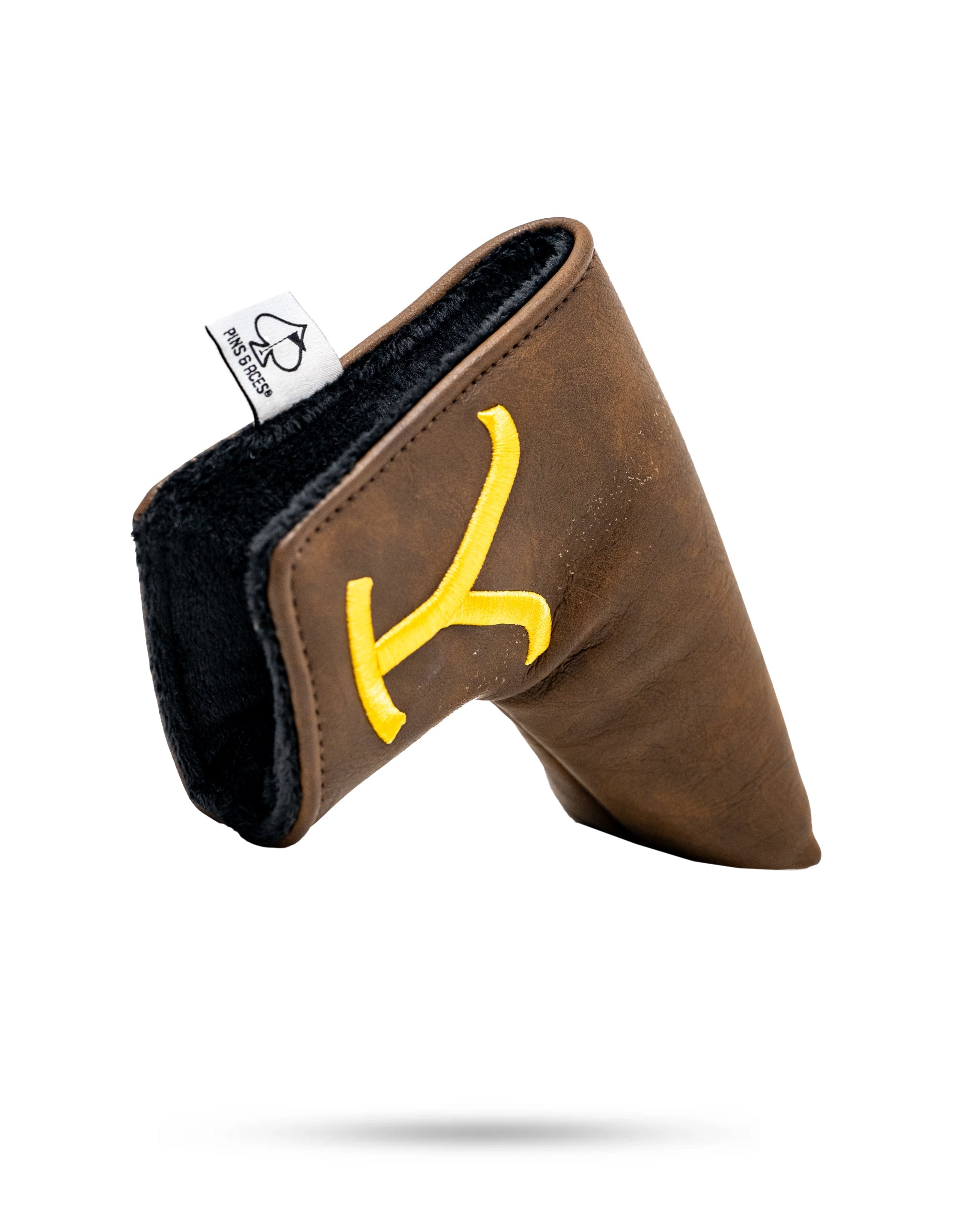 Yellowstone blade putter cover featuring a vibrant yellow and blue design with a textured finish.