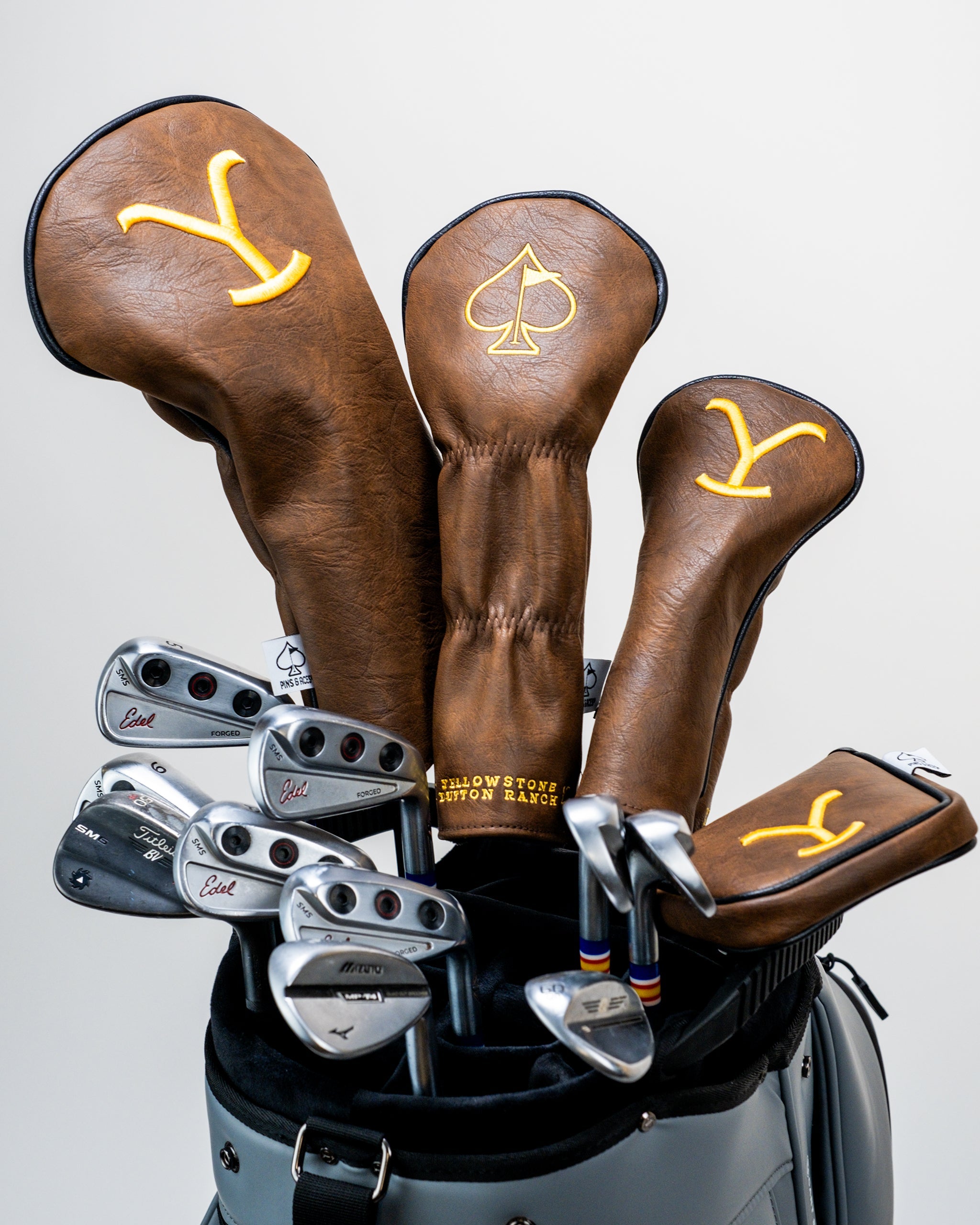 Yellowstone mallet putter cover featuring a vibrant design with a scenic Yellowstone landscape and protective padding.
