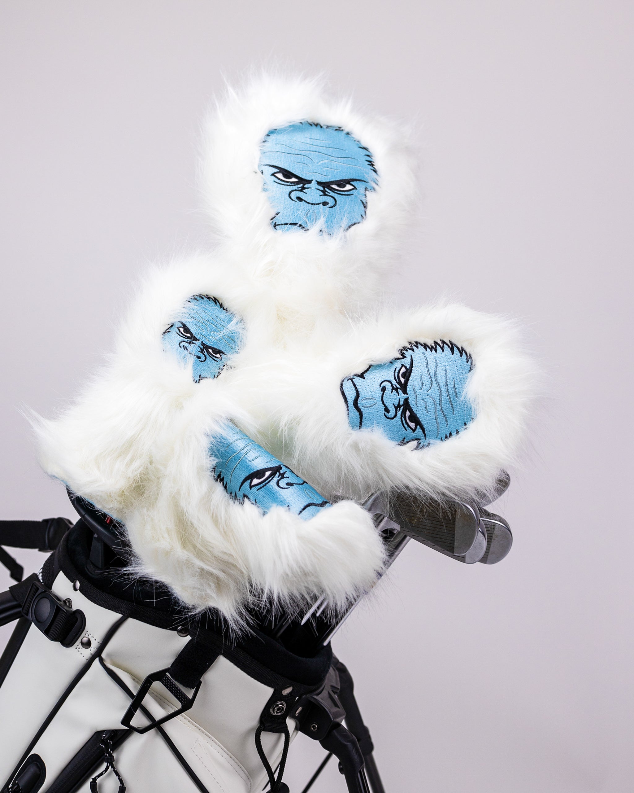 Yeti driver cover featuring a vibrant design with colorful accents and a soft, protective material.