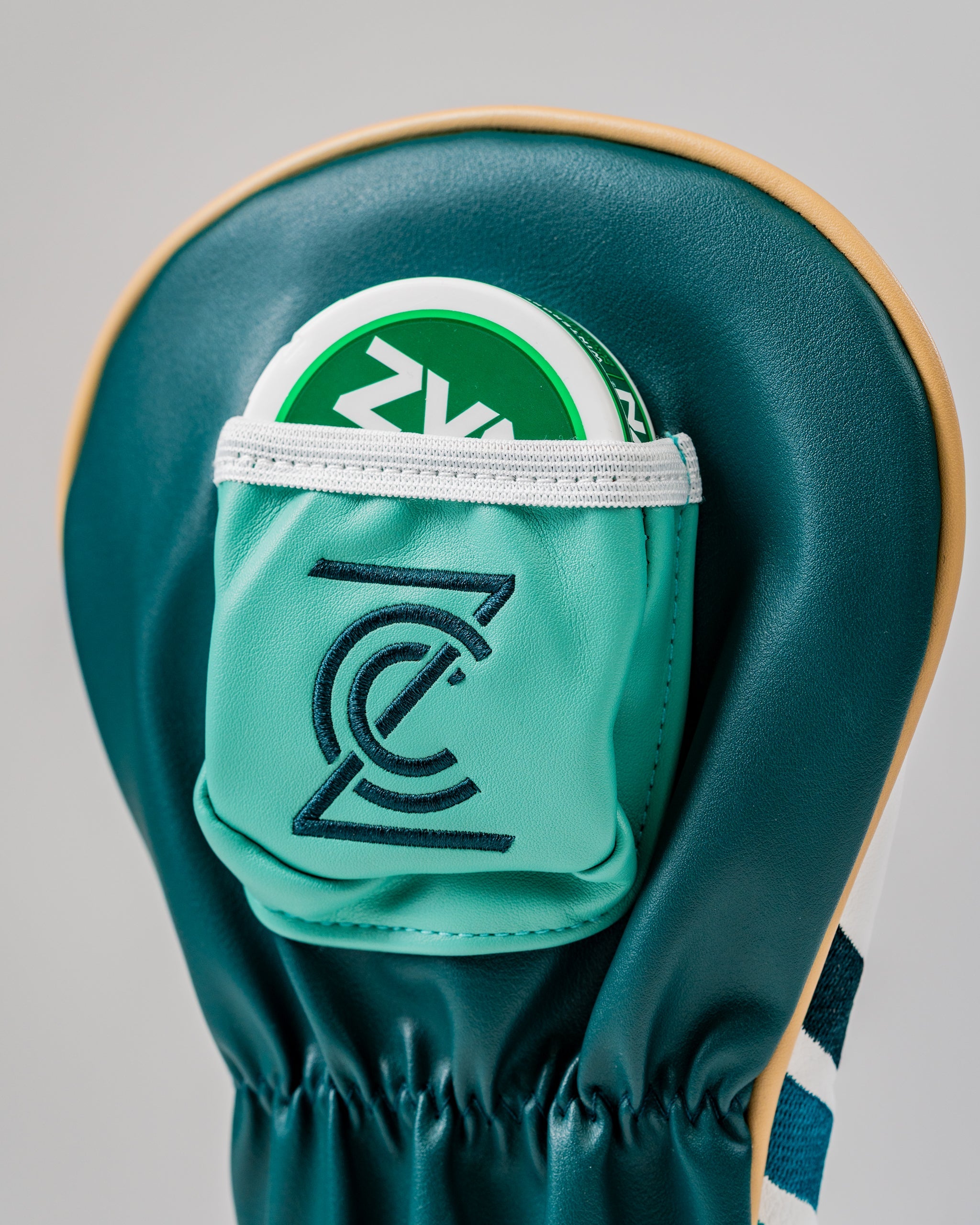 Zynbabwe Country Club Gator driver cover featuring a sleek design with a pocket for a golf ball. Perfect for stylish golfers.
