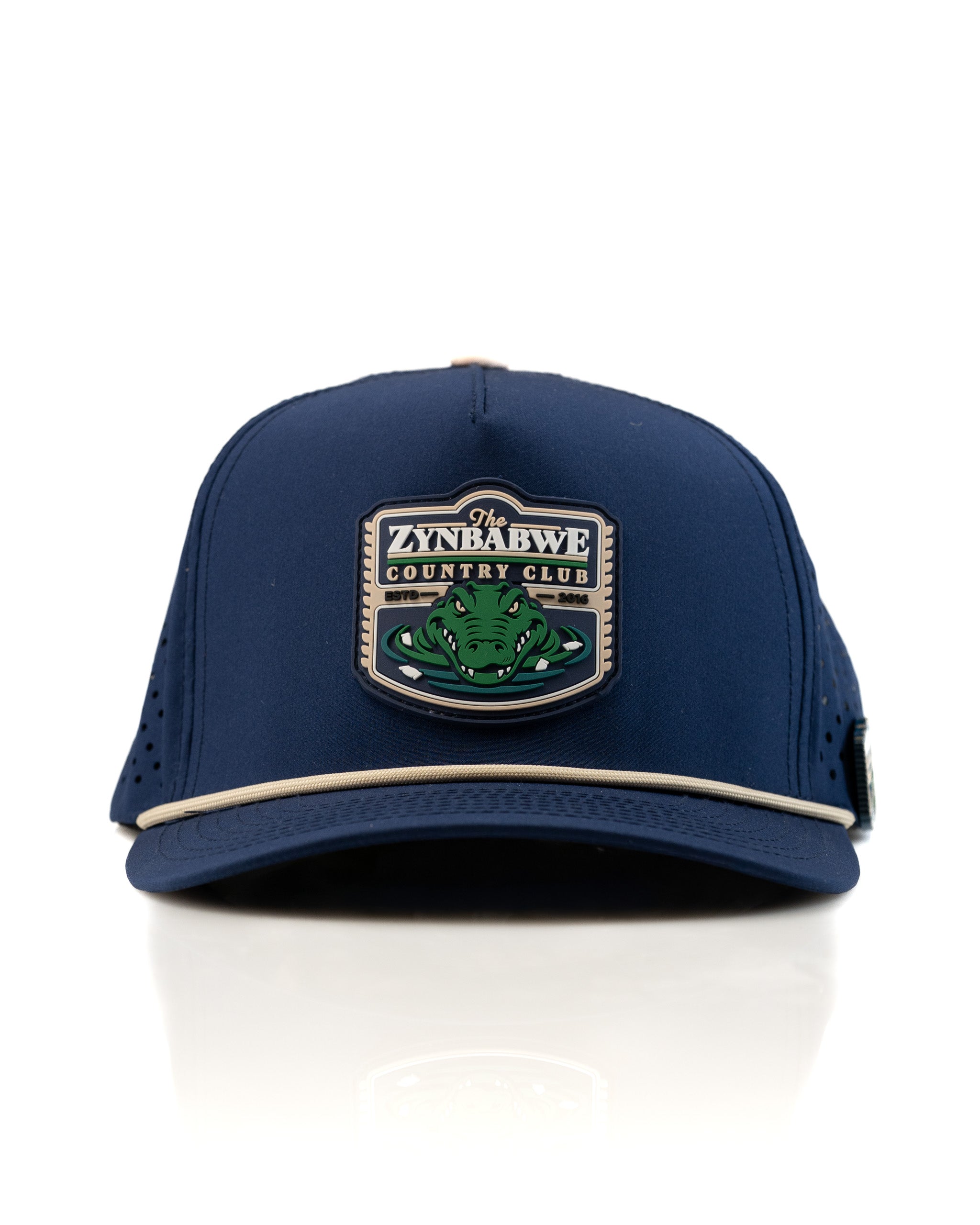 Navy perforated rope hat featuring a Zynbabwe Country Club logo with a green alligator design. Ideal for stylish golfers.