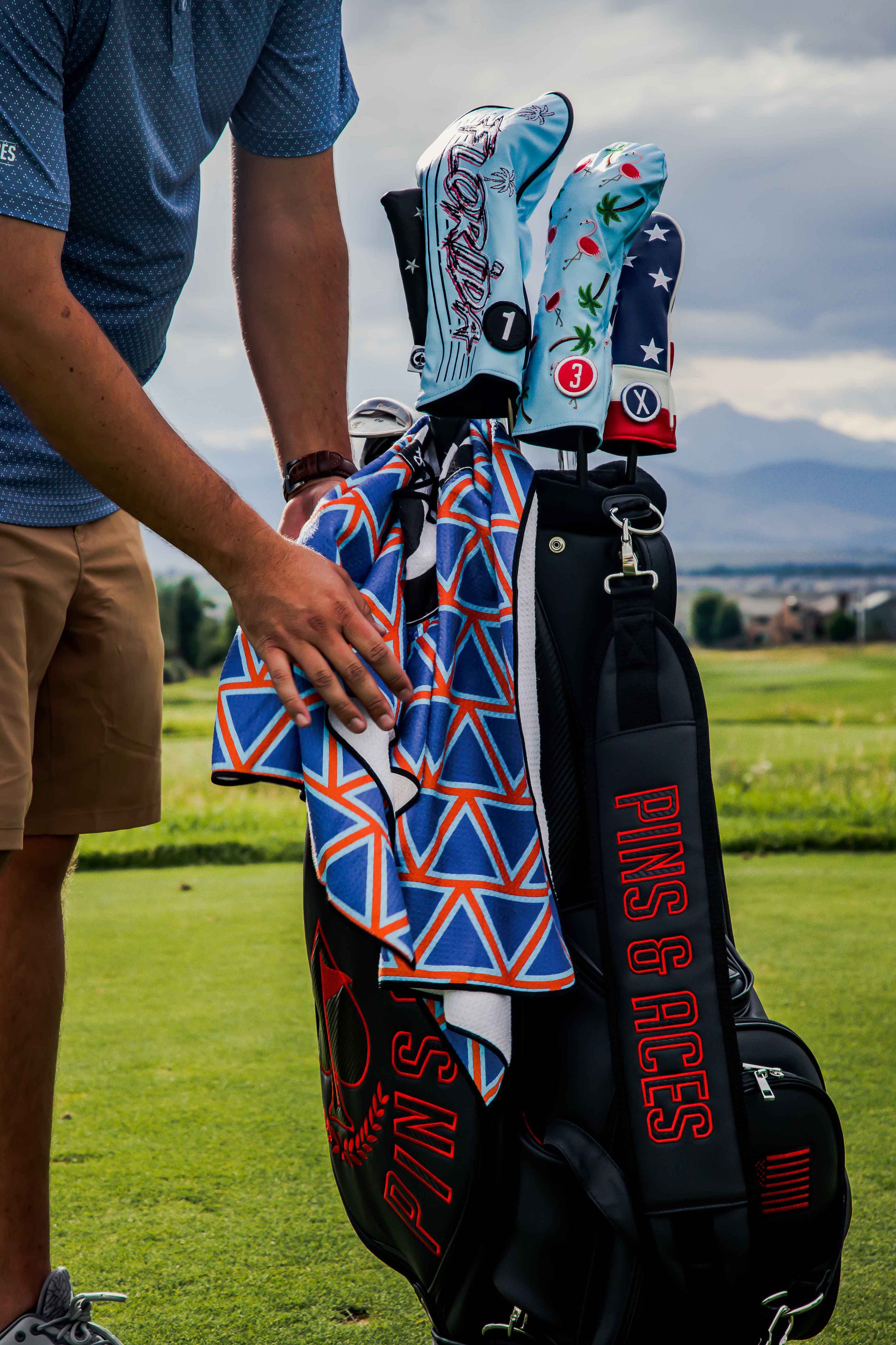 Colorful dancing flamingos fairway cover for golf clubs, featuring vibrant pink flamingo designs on a black background.